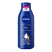 Lo&ccedil;&atilde;o Hidratante Corporal Nivea Milk Pele Seca a Extrasseca 200ml